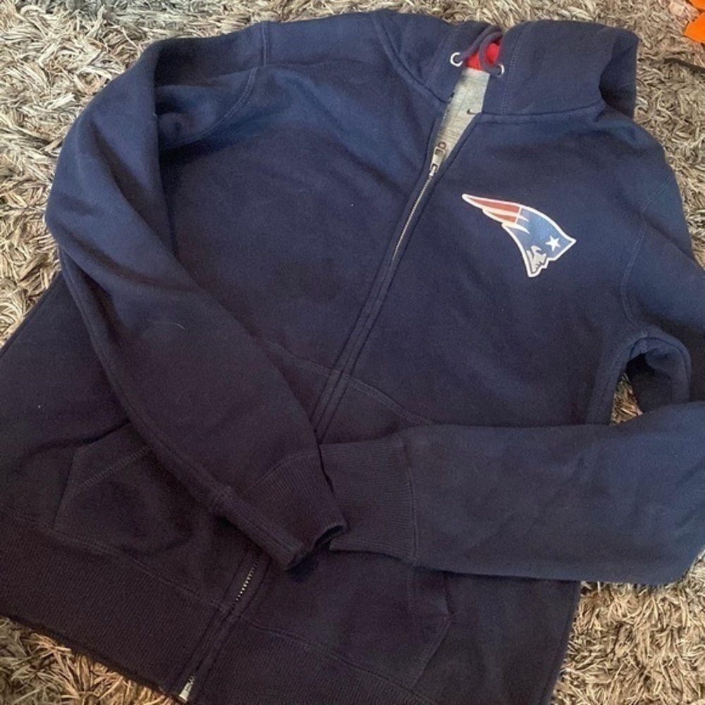 Womens NIKE Patriots NFL team zip up size M faded oil spot on front hard to see.